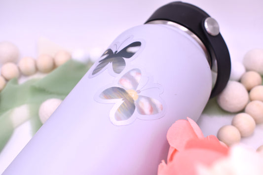 Night and day beach/ocean inspired butterflies- clear background sticker featured on a grey waterbottle