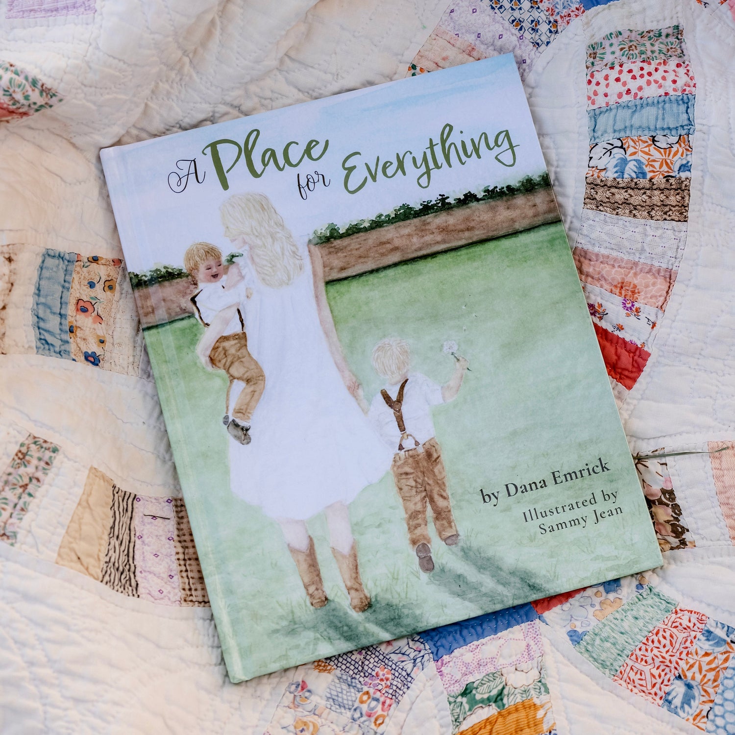 Children's book titled 'A Place for Everything' on a quilted surface