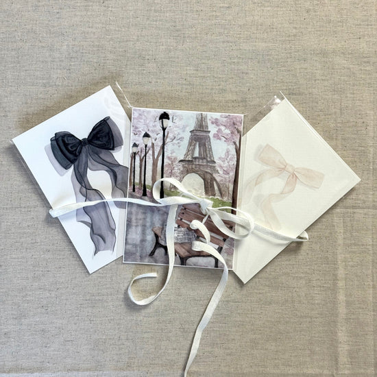 set of three prints- watercolor reproductions. spring in paris, black chiffon bow, neutral cream ribbon