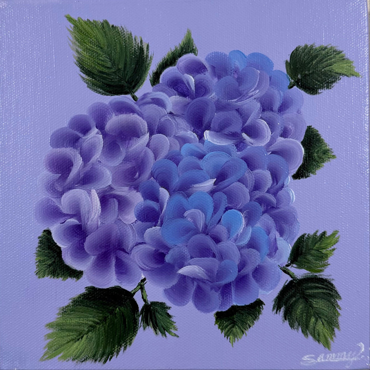 A small square canvas painting of purple and blue hydrangea flowers with green leaves on a lavender background, mounted on a textured beige wall.